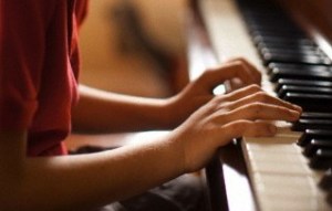 Boy playing piano